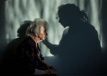 Elderly women and shadow abusing her