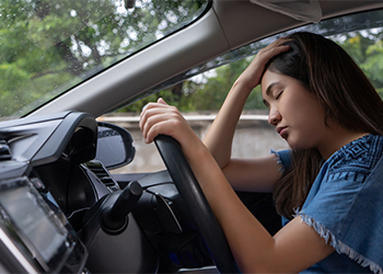 Stressed women inside car