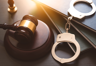 Crime and violence concept with handcuffs