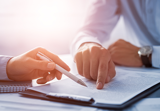 Business people negotiating a contract