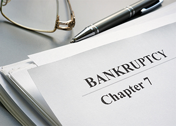 Chapter 7 Bankruptcy petition and glasses