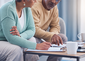 Couples discussing estate plan before signing