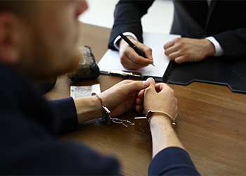 Man getting interrogated in criminal case
