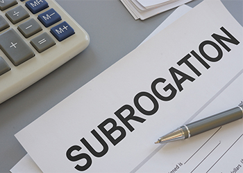 Word Subrogation written in a paper along with calculator