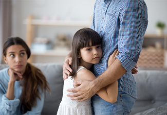 Unhappy little child hug leaving parent say goodbye