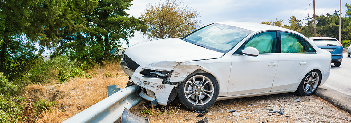 Crashed car with deflated airbags after accident