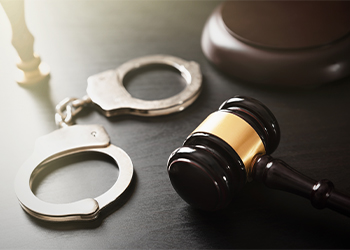 Gavel and handcuffs