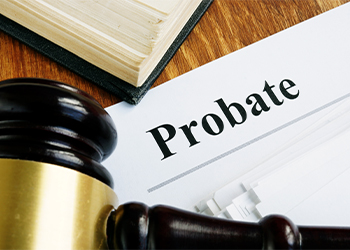 Probate sign, stack of papers and gavel
