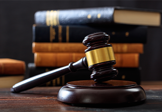 Judge gavel on a wooden desk
