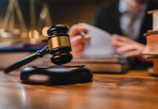 Judgment gavel hammer in court courtroom