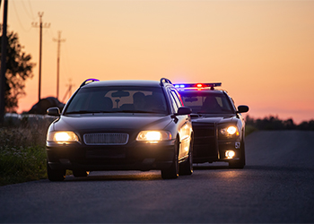 Driver getting pulled over by police officer