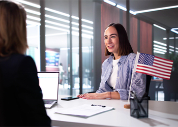 Women appearing for US visa interview