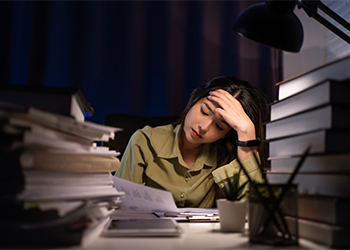 Frustrated women working till late in office