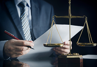 Lawyer or attorney works in his office