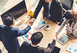Group business people handshake at meeting table