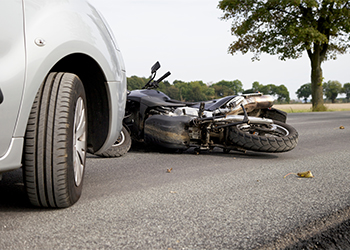 Motorcycle collision with car