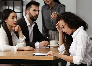 Woman suffering from discrimination in work