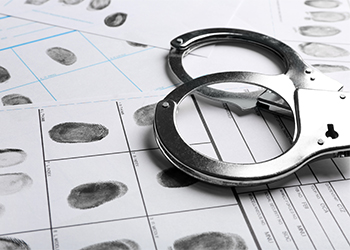 Handcuff and fingerprint record sheet