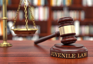 Juvenile law with gavel on table