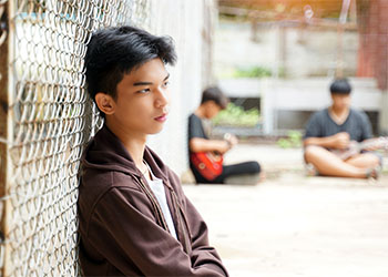 Teenager in juvenile detention center