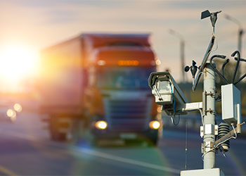 Surveillance camera and passing by truck
