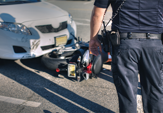 Bike and car accident on road