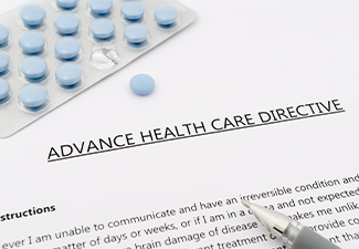 Advance health care directive with blue pills ans grey pen