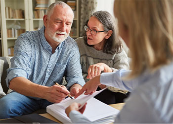 Old couple prepare estate plan with help of a professional
