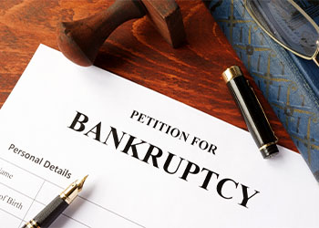 Petition for Bankruptcy on a table