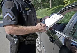 Police Officer Writing Speeding Ticket