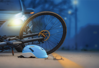 Accident car crash with bicycle on road at night time