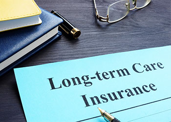 Long term Care Insurance policy on a table