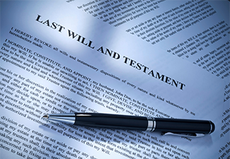 Last will and testament document and pen in table