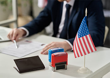 Officer going through visa application in US Immigration Office