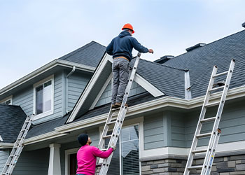 Site engineer inspecting house