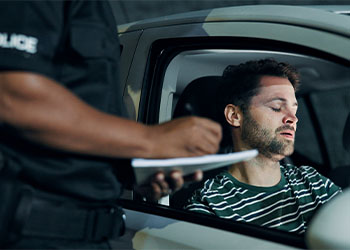 Man getting ticket for traffic violation