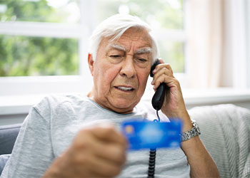 Scammed elderly man calling for help