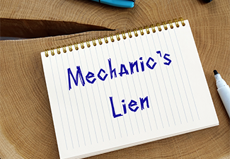 Mechanic's Lien phrase on the page and a pen