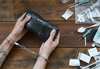 Drug trafficker arrested with their heroin packages