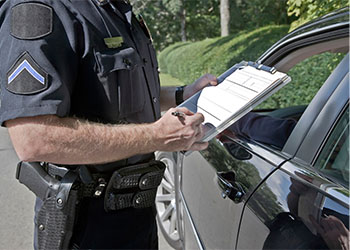 Driver getting booked for speeding