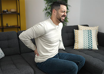 Man with severe back pain