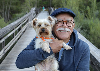 Old man with his pet dog