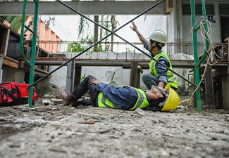 First aid support accident at work of builder worker in construction site