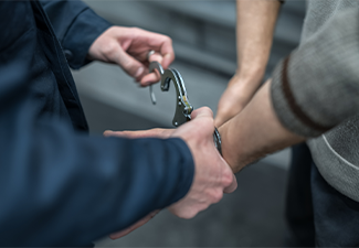 Police handcuffing the arrested person