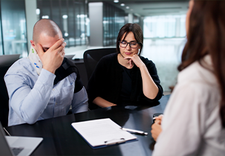 The Personal Injury Lawyer Meeting With An Unhappy Couple