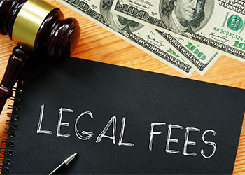 Legal Fees word on paper with gavel and bank note