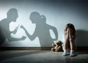 Little Girl Crying With Shadow Of Parents Arguing