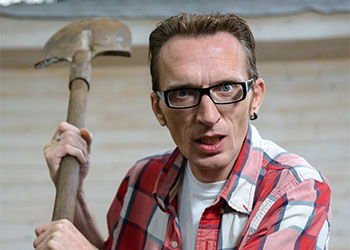 Angry man with spade in hand