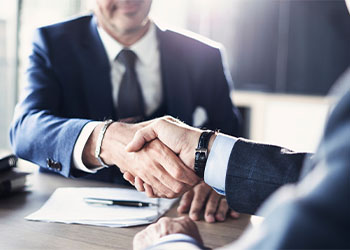 Businessmen shaking hands in agreement
