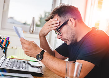 Frustrated businessman due to poor financial conditions